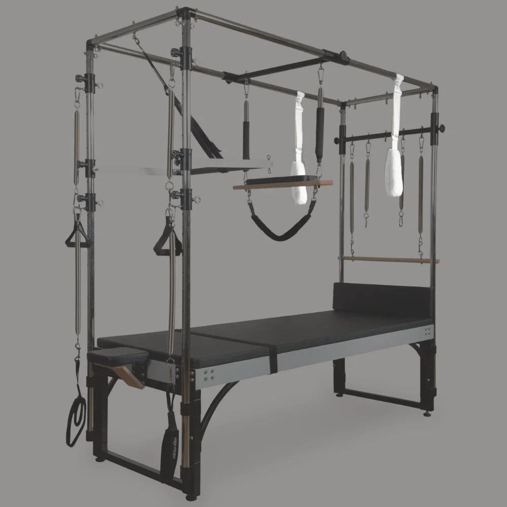 Pilates Cadillac with various attachments