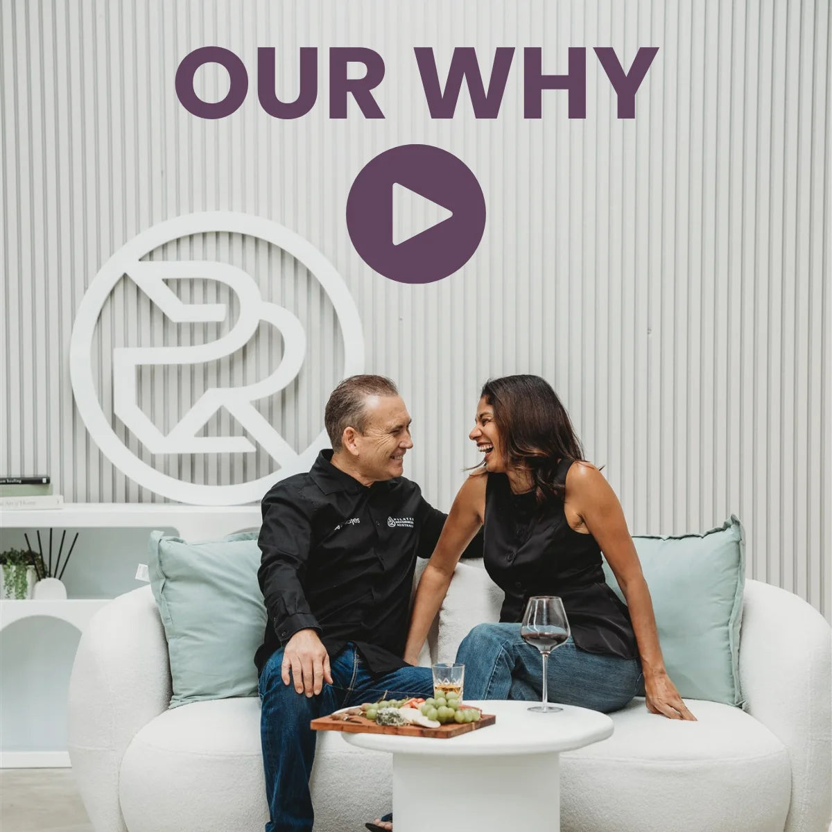 couple laughing on lounge