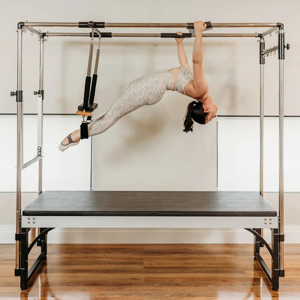 Person using a Pilates Cadillac