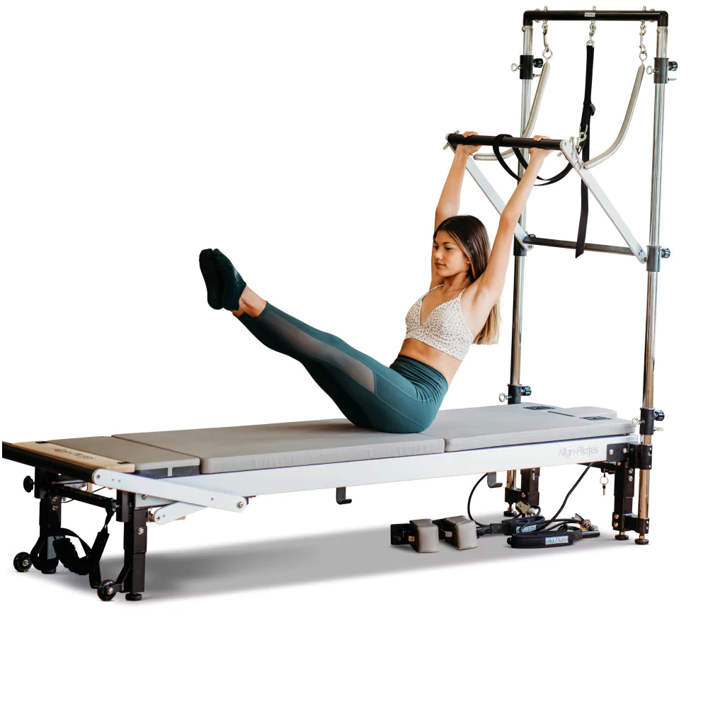 Pilates Reformer Compared to the Tower: Which Should You Choose